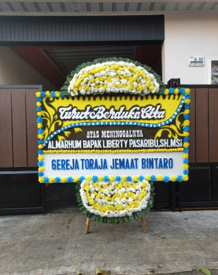 Papan Bunga Duka di Tirtoadi